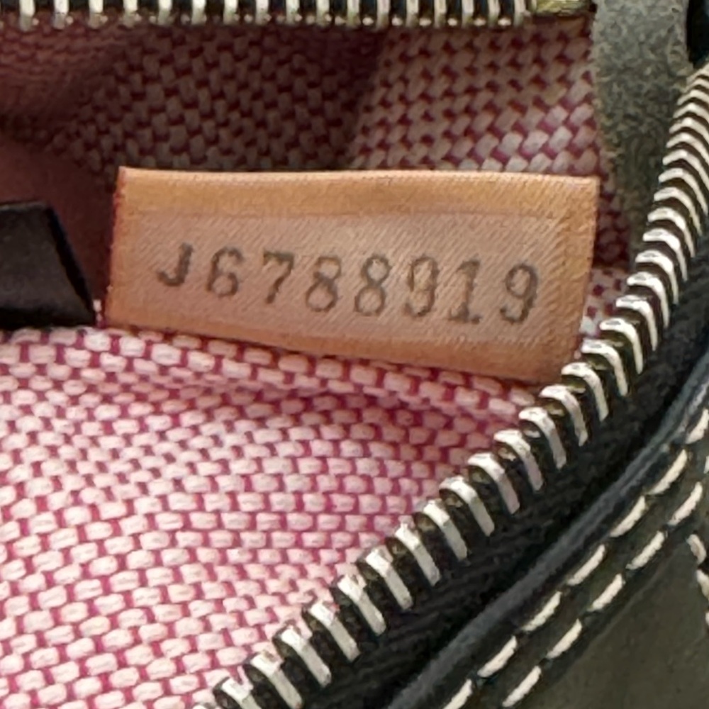Dooney & Bourke Black and White Satchel with Timeless Elegance - Picture 11 of 12